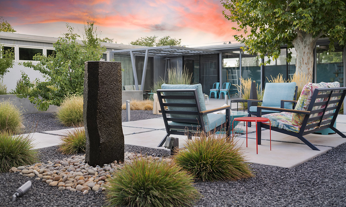 New Mexico Water Fountain Stone Forest Iron Pergola Concrete Slab Mid Century Modern Backyard Landscape Design